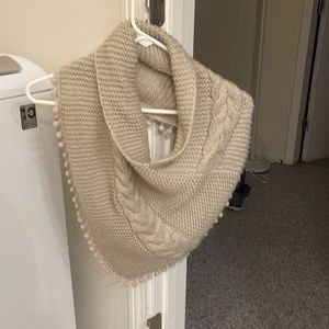 Knitted cream colored neck wrap